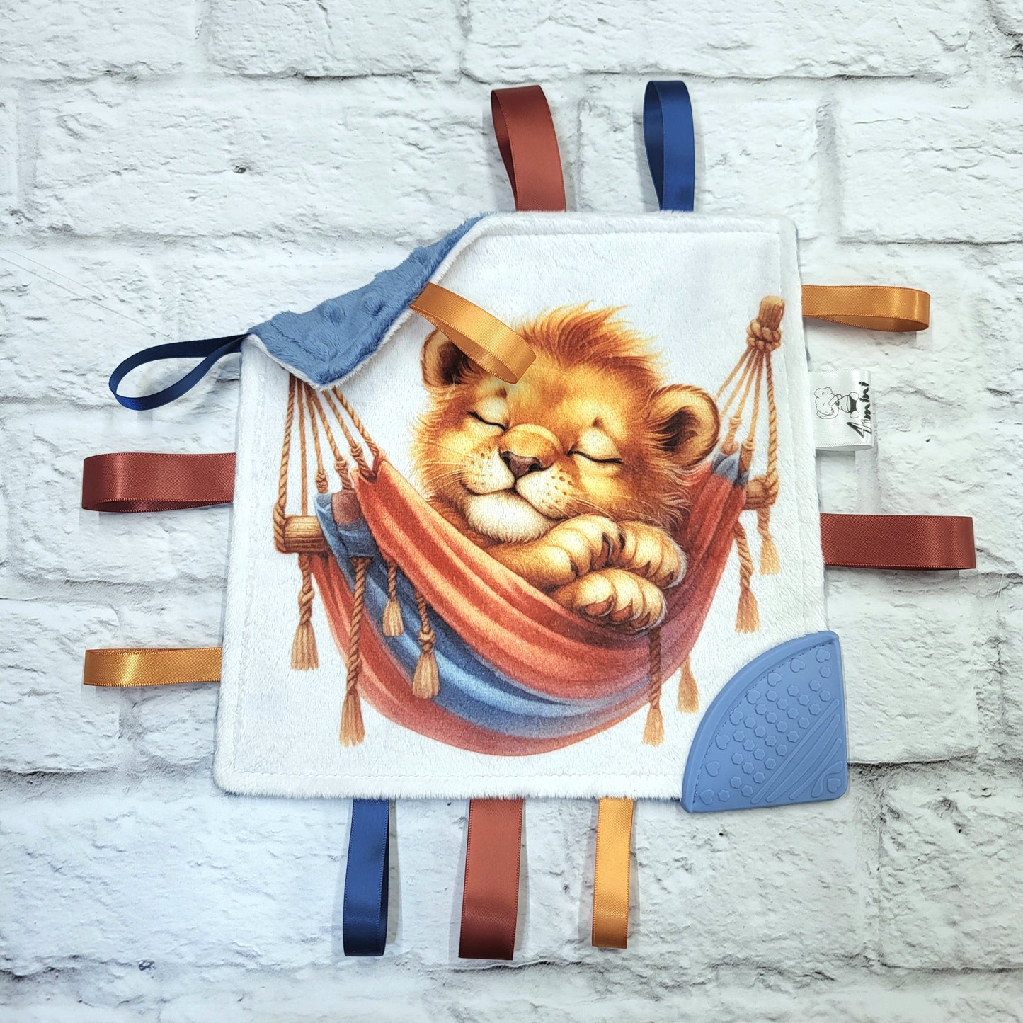 La sieste du lionceau - Doudou étiquettes craquante avec coin de dentition