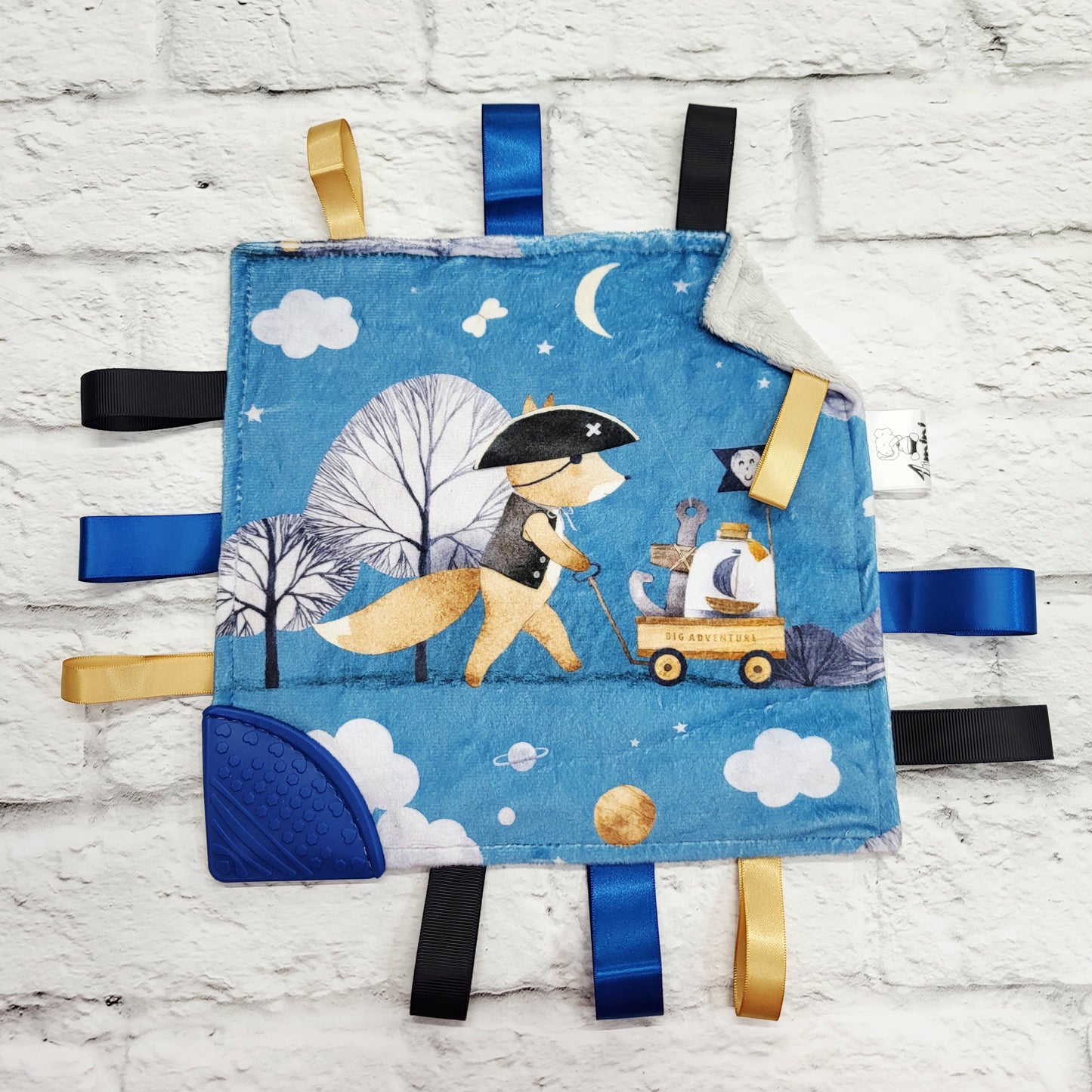 Grande aventure - Doudou étiquettes craquante avec coin de dentition
