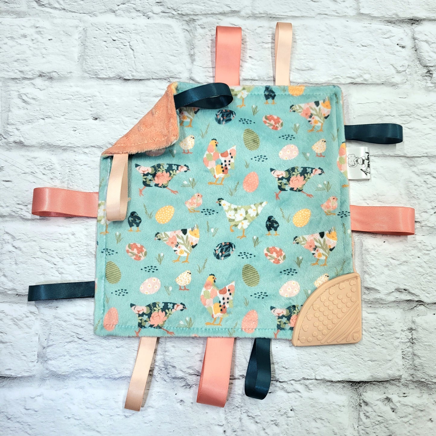 Poulettes fleuris - Doudou étiquettes craquante avec coin de dentition