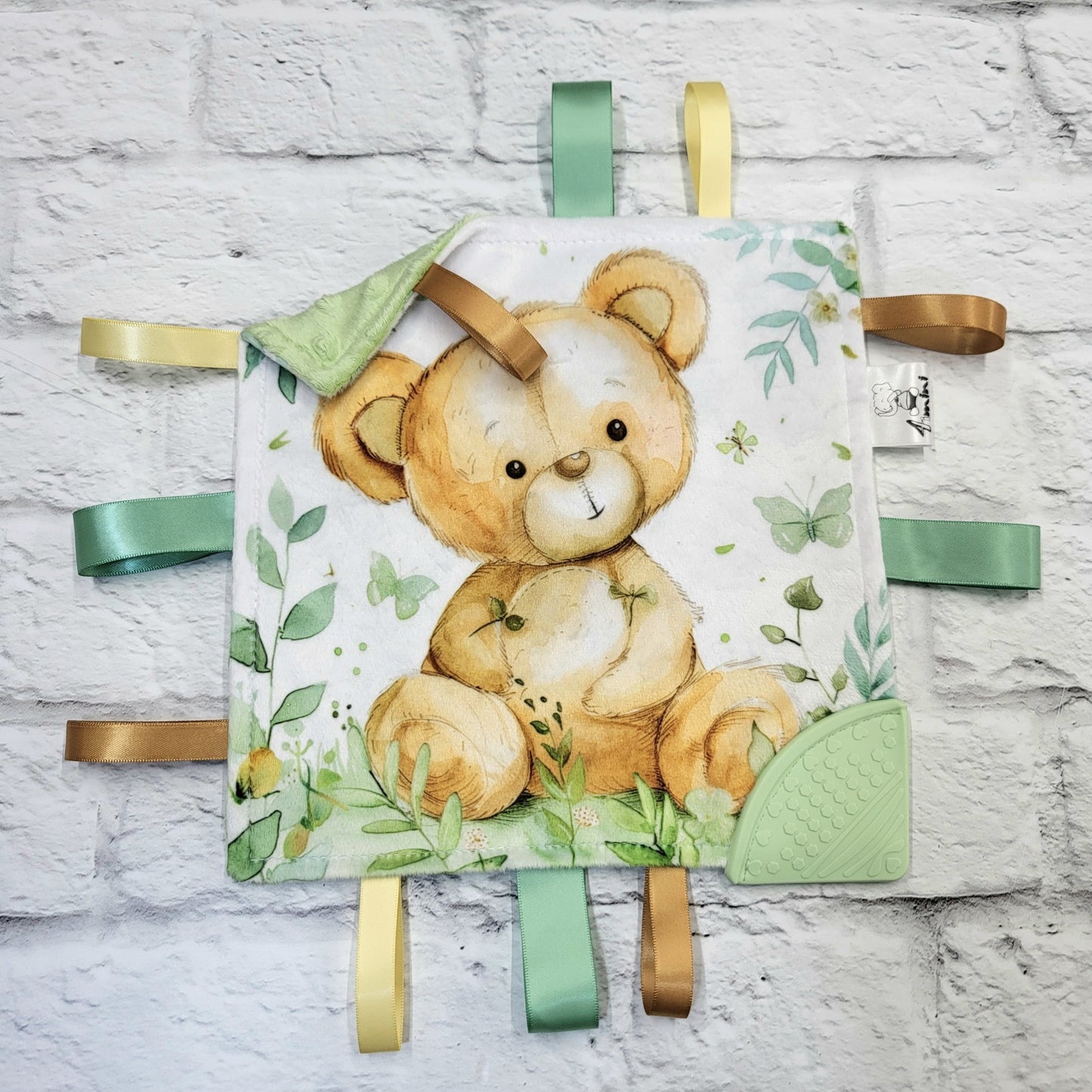 Câlin sous les feuilles - Doudou étiquettes craquante avec coin de dentition