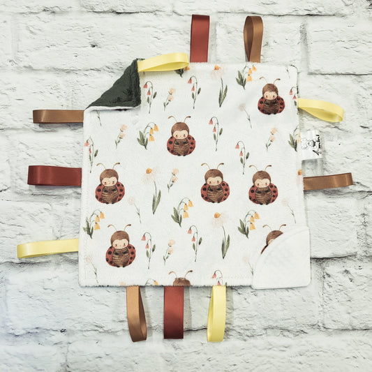 Mademoiselle coccinelle - Doudou étiquettes craquante avec coin de dentition