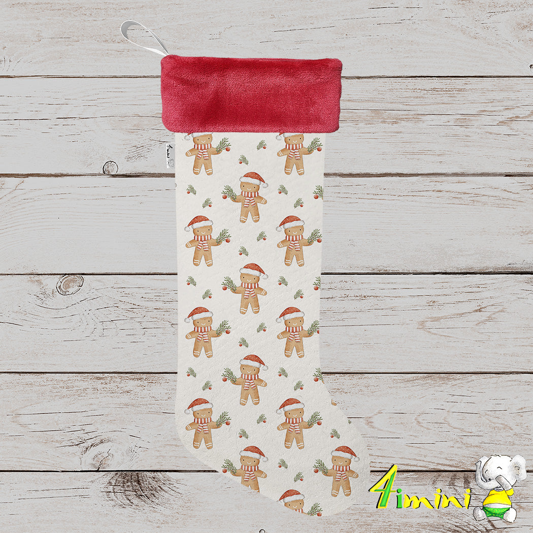 Bas de noël format à cadeau avec bordure rouge, avec le motif de joyeux bonhomme de pain d'épice coiffé d'une tuque de Noël, portant un foulard rayé et tenant une délicate branche de sapin ornée d'une boule festive par 4Timini