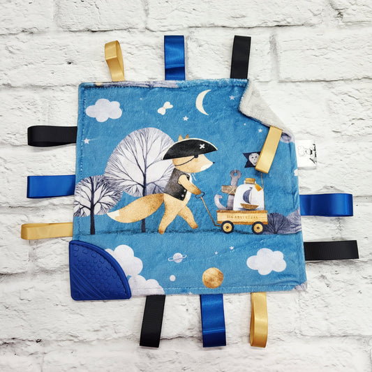 Grande aventure - Doudou étiquettes craquante avec coin de dentition